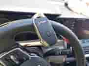 2023 Kia Sorento EX with VIN 5XYRH4LF5PG228054, listed as a IAAI auction lot 42641510 with 16,596 mi miles and . Bid and sale history available at DreamBid. Image 11.