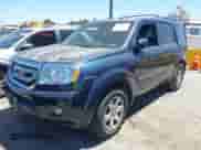 2011 Honda Pilot Touring с VIN 5FNYF3H98BB056455, выставлен на аукционе IAAI как лот 42897379 с пробегом 173 871 миль миль и . История ставок и продаж доступна на DreamBid. Изображение 17.