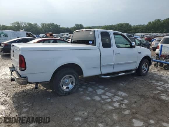 2001 Ford F-150 XL with VIN 1FTZX17231KF34373, listed as a Copart auction lot 68665815 with 161,328 mi miles and Clean title. Bid and sale history available at DreamBid. Image 3.