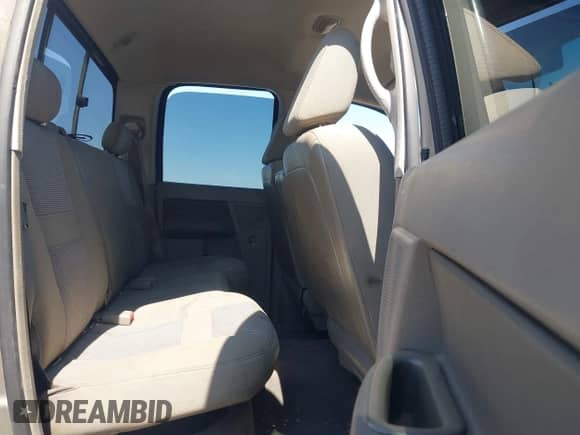 2006 Dodge 1500 SLT z VIN 1D7HU18236S628902, wystawiony jako IAAI lot #43155885 z przebiegiem Nie podano mil oraz . Historia ofert i sprzedaży dostępna na DreamBid. Obrazek 8.