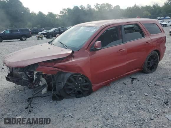 2015 Dodge Durango R/T with VIN 1C4SDHCT9FC849813, listed as a Copart auction lot 61818295 with 115,811 mi miles and Salvage title. Bid and sale history available at DreamBid. Image 1.