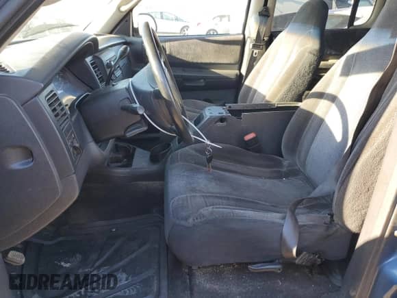 2004 Dodge Dakota Sport z VIN 1D7HL38NX4S789687, wystawiony jako Copart lot #77435824 z przebiegiem 157 993 mil mil oraz Szkoda całkowita • Salvage title. Historia ofert i sprzedaży dostępna na DreamBid. Obrazek 7.