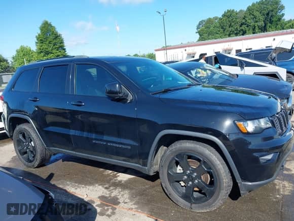 2019 Jeep Grand Cherokee Altitude с VIN 1C4RJEAGXKC571803, выставлен на аукционе IAAI как лот 42535283 с пробегом 128 552 миль миль и . История ставок и продаж доступна на DreamBid. Изображение 13.