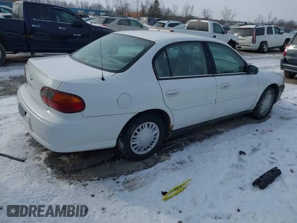 2004 Chevrolet Malibu Classic z VIN 1G1ND52F84M664305, wystawiony jako IAAI lot #41350687 z przebiegiem Nie podano mil oraz . Historia ofert i sprzedaży dostępna na DreamBid. Obrazek 4.