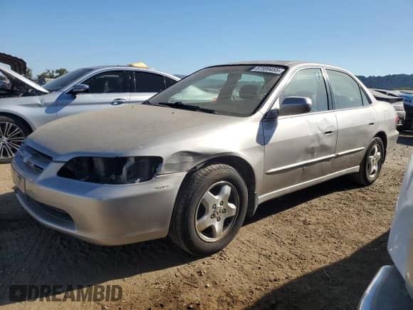 1999 Honda Accord EX with VIN 1HGCG1654XA010134, listed as a Copart auction lot 67599455 with 263,752 mi miles and Salvage title. Bid and sale history available at DreamBid. Image 1.