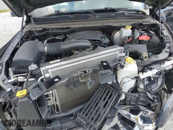 2021 Ram 1500 Laramie с VIN 1C6SRFJT3MN718913, выставлен на аукционе Copart как лот 69235235 с пробегом 115 140 миль миль и Списание • Salvage title. История ставок и продаж доступна на DreamBid. Изображение 11.