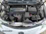 2009 Toyota Camry LE z VIN 4T1BE46KX9U806116, wystawiony jako Copart lot #85261255 z przebiegiem 196 982 mil mil oraz Czysty tytuł • Clean title. Historia ofert i sprzedaży dostępna na DreamBid. Obrazek 11.