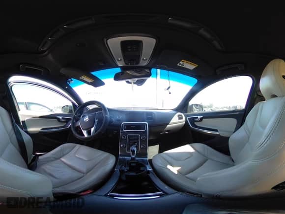 2015 Volvo S60 T5 Drive-E Premier with VIN YV126MFB5F1299795, listed as a IAAI auction lot 43052703 with 100,066 mi miles and . Bid and sale history available at DreamBid. Image 18.
