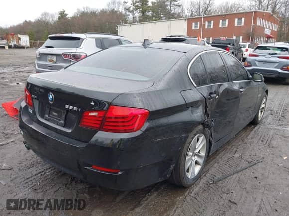 2016 BMW 5 Series 528i xDrive with VIN WBA5A7C54GG150226, listed as a IAAI auction lot 41982893 with 214,304 mi miles and . Bid and sale history available at DreamBid. Image 4.