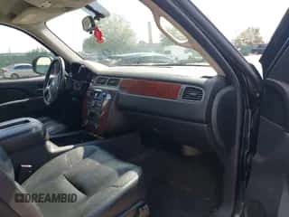 2012 Chevrolet Suburban LT z VIN 1GNSKJE75CR112461, wystawiony jako IAAI lot #43325585 z przebiegiem 157 216 mil mil oraz . Historia ofert i sprzedaży dostępna na DreamBid. Obrazek 5.