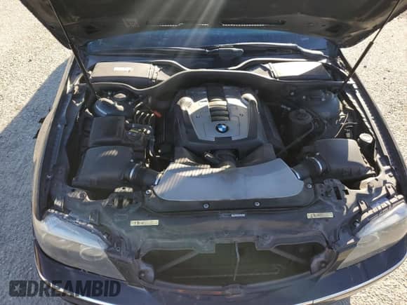 2007 BMW 7 Series 750i z VIN WBAHL83567DT07642, wystawiony jako Copart lot #56550605 z przebiegiem Nie podano mil oraz Szkoda całkowita • Salvage title. Historia ofert i sprzedaży dostępna na DreamBid. Obrazek 11.