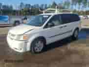 2009 Dodge Grand Caravan Cargo with VIN 2D4HN11E09R685028, listed as a Copart auction lot 77095054 with 240,140 mi miles and Salvage title. Bid and sale history available at DreamBid. Image 1.