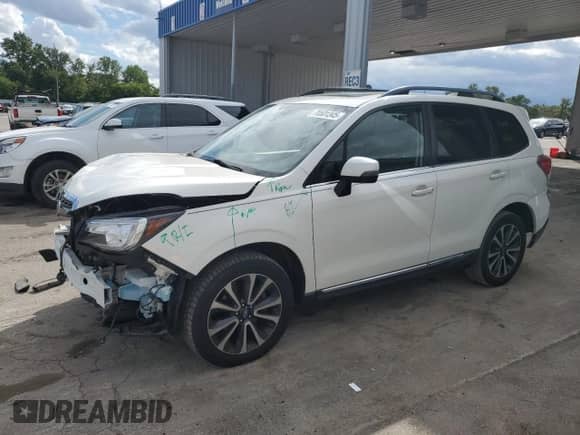 2017 Subaru Forester Touring z VIN JF2SJGWCXHH453105, wystawiony jako Copart lot #70501345 z przebiegiem 146 190 mil mil oraz Szkoda całkowita • Salvage title. Historia ofert i sprzedaży dostępna na DreamBid. Obrazek 1.