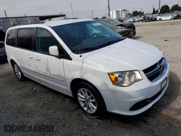 2014 Dodge Grand Caravan SXT 30th Anniversary with VIN 2C4RDGCG7ER184153, listed as a Copart auction lot 64866445 with 193,640 mi miles and Clean title. Bid and sale history available at DreamBid. Image 4.