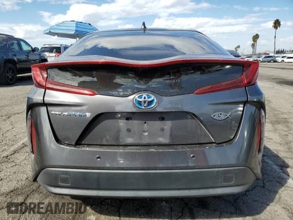 2018 Toyota Prius Plus z VIN JTDKARFP7J3086633, wystawiony jako Copart lot #82094685 z przebiegiem 275 692 mil mil oraz Szkoda całkowita • Salvage title. Historia ofert i sprzedaży dostępna na DreamBid. Obrazek 6.