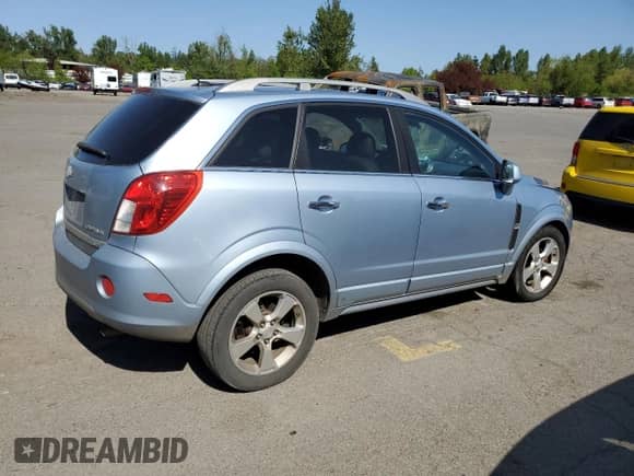 2013 Chevrolet Captiva Sport LTZ z VIN 3GNAL4EK7DS619875, wystawiony jako Copart lot #54088725 z przebiegiem Nie podano mil oraz Szkoda całkowita • Salvage title. Historia ofert i sprzedaży dostępna na DreamBid. Obrazek 3.