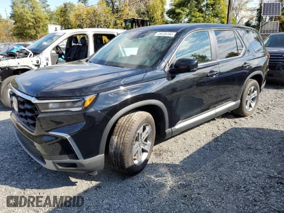 2024 Honda Pilot EX-L with VIN 5FNYG1H51RB019899, listed as a Copart auction lot 75478704 with 7,397 mi miles and Salvage title. Bid and sale history available at DreamBid. Image 1.