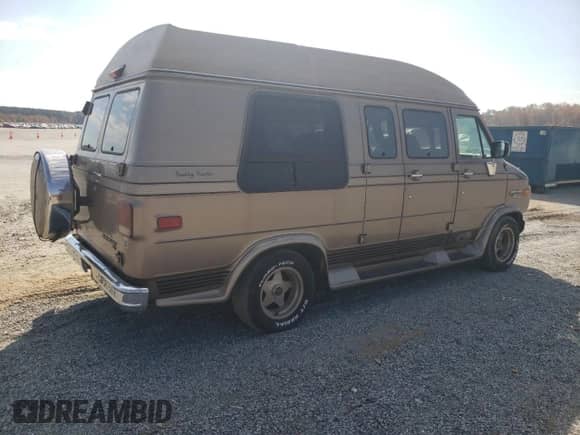 1995 Chevrolet Chevy Van with VIN 1GBEG25K9SF175004, listed as a Copart auction lot 77952694 with 217,649 mi miles and Salvage title. Bid and sale history available at DreamBid. Image 3.