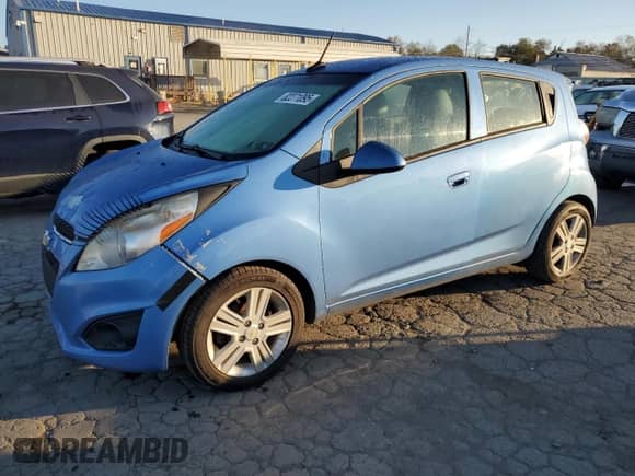 2014 Chevrolet Spark LS with VIN KL8CB6S97EC523116, listed as a Copart auction lot 82271095 with 74,197 mi miles and Clean title. Bid and sale history available at DreamBid. Image 1.
