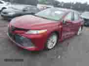 2020 Toyota Camry Hybrid XLE with VIN 4T1F31AK5LU016727, listed as a IAAI auction lot 42885382 with 14,854 mi miles and . Bid and sale history available at DreamBid. Image 2.