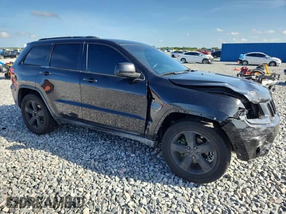 2014 Jeep Grand Cherokee Laredo with VIN 1C4RJEAG0EC322270, listed as a Copart auction lot 60334555 with 114,115 mi miles and Salvage title. Bid and sale history available at DreamBid. Image 4.