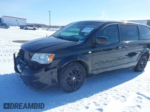 2014 Dodge Grand Caravan SXT with VIN 2C4RDGBGXER226395, listed as a IAAI auction lot 41561208 with 174,781 mi miles and . Bid and sale history available at DreamBid. Image 2.