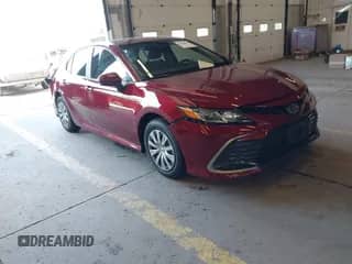 2022 Toyota Camry Hybrid LE with VIN 4T1C31AK7NU585634, listed as a IAAI auction lot 42443856 with 31,756 mi miles and . Bid and sale history available at DreamBid. Image 1.