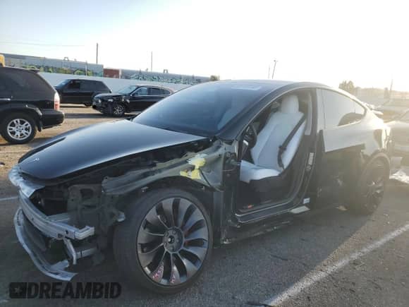 2022 Tesla Model Y Performance with VIN 7SAYGDEF9NF393852, listed as a Copart auction lot 63141094 with 26,972 mi miles and Salvage title. Bid and sale history available at DreamBid. Image 1.