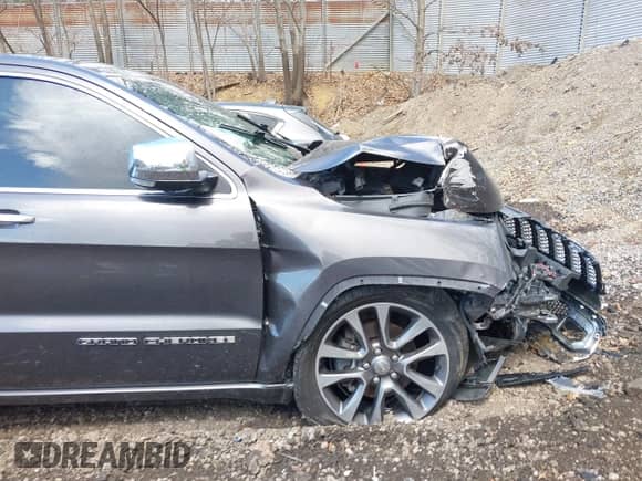 2018 Jeep Grand Cherokee Overland with VIN 1C4RJFCG7JC341816, listed as a IAAI auction lot 42031339 with 111,333 mi miles and . Bid and sale history available at DreamBid. Image 22.