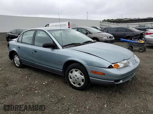 2002 Saturn SL with VIN 1G8ZH528X2Z169290, listed as a Copart auction lot 68372645 with 72,983 mi miles and Salvage title. Bid and sale history available at DreamBid. Image 13.