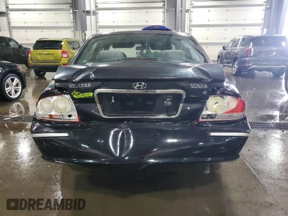 2004 Hyundai Sonata GLS with VIN KMHWF35H74A065531, listed as a Copart auction lot 58972164 with 96,352 mi miles and Salvage title. Bid and sale history available at DreamBid. Image 6.