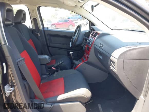 2009 Dodge Caliber SXT with VIN 1B3HB48C29D187901, listed as a IAAI auction lot 42727025 with 112,799 mi miles and . Bid and sale history available at DreamBid. Image 5.