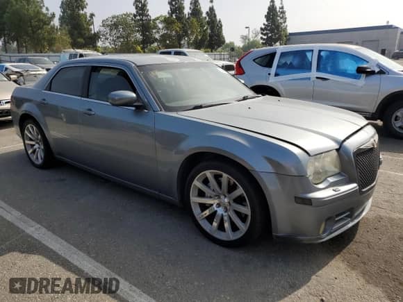 2006 Chrysler 300 C SRT-8 с VIN 2C3LA73W76H508574, выставлен на аукционе Copart как лот 69081025 с пробегом 196 734 миль миль и Чистый • Clean title. История ставок и продаж доступна на DreamBid. Изображение 4.