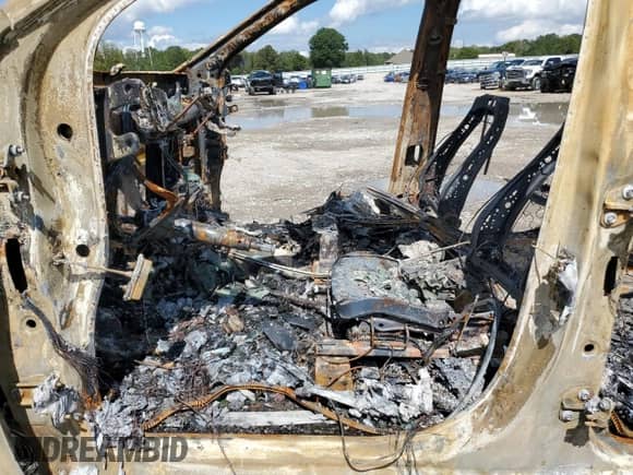 2021 GMC Sierra 1500 Denali with VIN 3GTU9FET0MG124672, listed as a Copart auction lot 84249065 with Not provided miles and Salvage title. Bid and sale history available at DreamBid. Image 7.