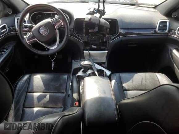 2015 Jeep Grand Cherokee Overland с VIN 1C4RJFCT5FC124995, выставлен на аукционе Copart как лот 61995845 с пробегом 63 808 миль миль и Списание • Salvage title. История ставок и продаж доступна на DreamBid. Изображение 8.