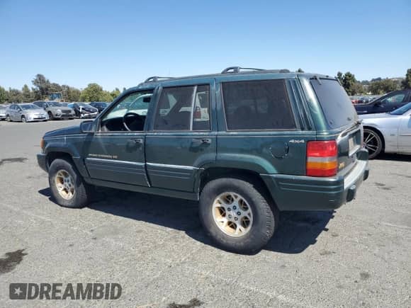 1997 Jeep Grand Cherokee Limited с VIN 1J4GZ78Y3VC645099, выставлен на аукционе Copart как лот 65485635 с пробегом 178 319 миль миль и Чистый • Clean title. История ставок и продаж доступна на DreamBid. Изображение 2.