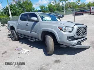 2020 Toyota Tacoma TRD Sport z VIN 3TMAZ5CN0LM137942, wystawiony jako IAAI lot #43275993 z przebiegiem 49 225 mil mil oraz . Historia ofert i sprzedaży dostępna na DreamBid. Obrazek 1.