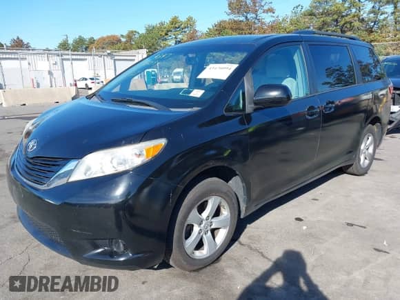 2016 Toyota Sienna LE with VIN 5TDKK3DCXGS761666, listed as a IAAI auction lot 43476094 with 209,689 mi miles and . Bid and sale history available at DreamBid. Image 2.