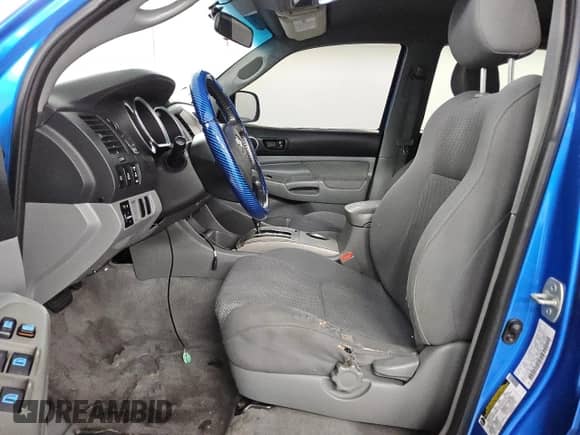 2005 Toyota Tacoma PreRunner with VIN 3TMJU62N05M002100, listed as a Copart auction lot 84837805 with 300,227 mi miles and Clean title. Bid and sale history available at DreamBid. Image 7.