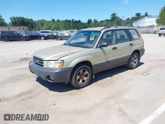 2003 Subaru Forester X with VIN JF1SG63653H762260, listed as a IAAI auction lot 42822727 with 142,236 mi miles and . Bid and sale history available at DreamBid. Image 2.