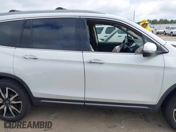 2021 Honda Pilot Elite with VIN 5FNYF6H04MB079091, listed as a IAAI auction lot 42739979 with 62,723 mi miles and . Bid and sale history available at DreamBid. Image 14.