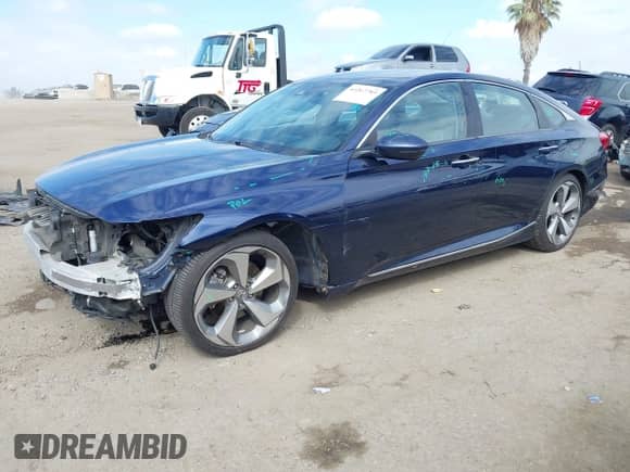 2018 Honda Accord Touring with VIN 1HGCV1F99JA127062, listed as a IAAI auction lot 43267783 with 89,673 mi miles and . Bid and sale history available at DreamBid. Image 2.