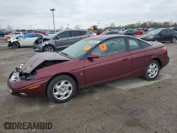 2002 Saturn SC with VIN 1G8ZY12732Z176596, listed as a Copart auction lot 50506894 with Not provided miles and Salvage title. Bid and sale history available at DreamBid. Image 1.