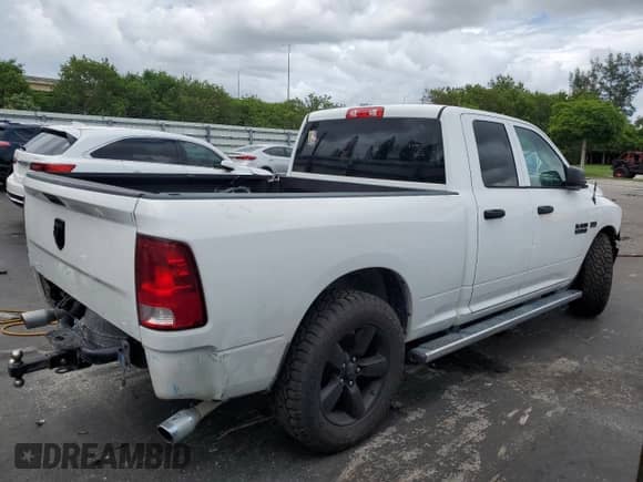 2018 Ram 1500 Tradesman z VIN 1C6RR6FT2JS100454, wystawiony jako Copart lot #64715365 z przebiegiem 145 068 mil mil oraz Szkoda całkowita • Salvage title. Historia ofert i sprzedaży dostępna na DreamBid. Obrazek 3.