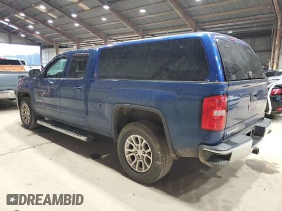 2017 GMC Sierra 1500 SLE z VIN 1GTV2MEC4HZ193075, wystawiony jako Copart lot #69818515 z przebiegiem 169 360 mil mil oraz Czysty tytuł • Clean title. Historia ofert i sprzedaży dostępna na DreamBid. Obrazek 2.