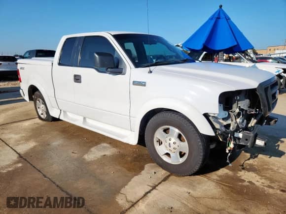 2006 Ford F-150 STX with VIN 1FTRX12W96KA93298, listed as a Copart auction lot 71130175 with 214,024 mi miles and Clean title. Bid and sale history available at DreamBid. Image 4.