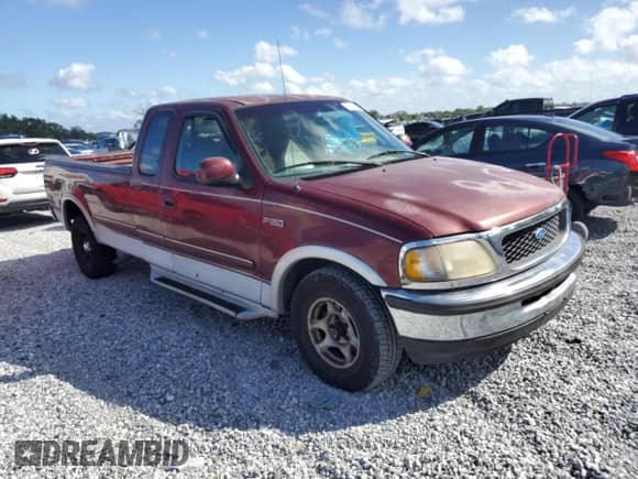 1997 Ford F-150 с VIN 1FTDX1768VNA43878, выставлен на аукционе Copart как лот 85664215 с пробегом 38 960 миль миль и Списание • Salvage title. История ставок и продаж доступна на DreamBid. Изображение 4.