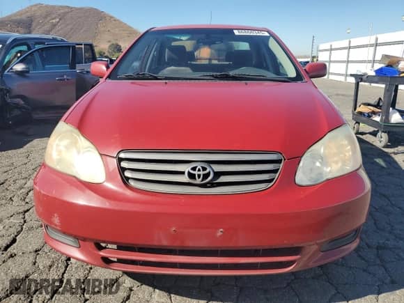 2003 Toyota Corolla LE z VIN JTDBR32E930034029, wystawiony jako Copart lot #86860345 z przebiegiem 299 999 mil mil oraz Szkoda całkowita • Salvage title. Historia ofert i sprzedaży dostępna na DreamBid. Obrazek 5.