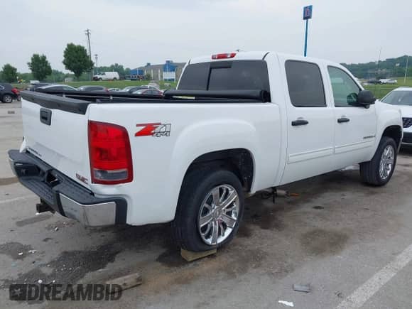 2009 GMC Sierra 1500 SLT with VIN 3GTEK33M19G200006, listed as a IAAI auction lot 42469420 with 197,985 mi miles and . Bid and sale history available at DreamBid. Image 4.