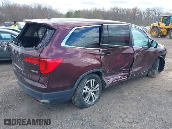 2017 Honda Pilot EX-L with VIN 5FNYF6H74HB040889, listed as a IAAI auction lot 42040094 with 84,001 mi miles and . Bid and sale history available at DreamBid. Image 4.